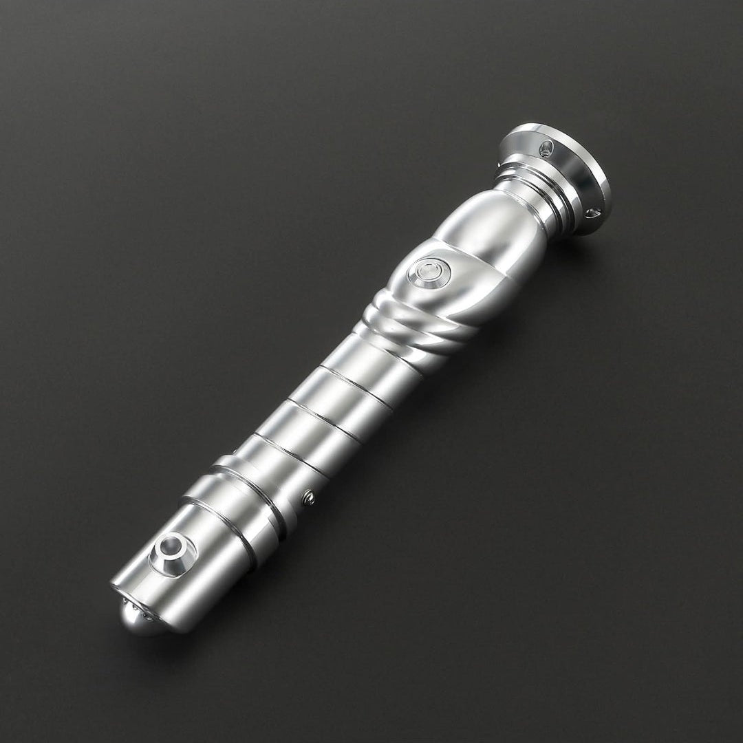 Silver saber hilt on grey background