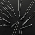 Saber X saber necklaces showing all 10 available hilt designs, sold individually